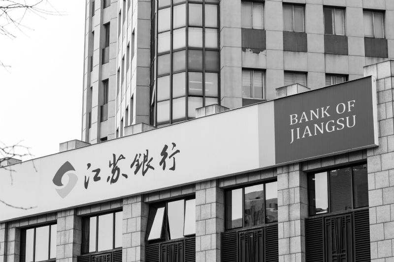 江苏银行2022年净利增长29.45%领跑同业总资产近3万亿不良率0.94%上市后持续下降