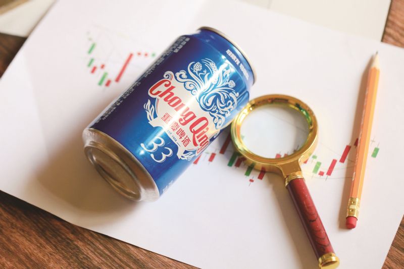 重庆啤酒净利减逾2亿分红率104%研发费三连降高档产品收入降2.97%